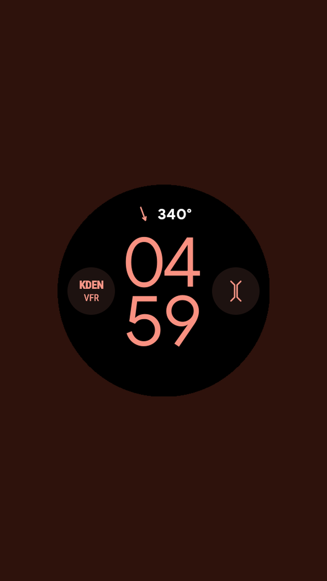Digital watch face showing a pinned airport identifier with wind and flight-category complications