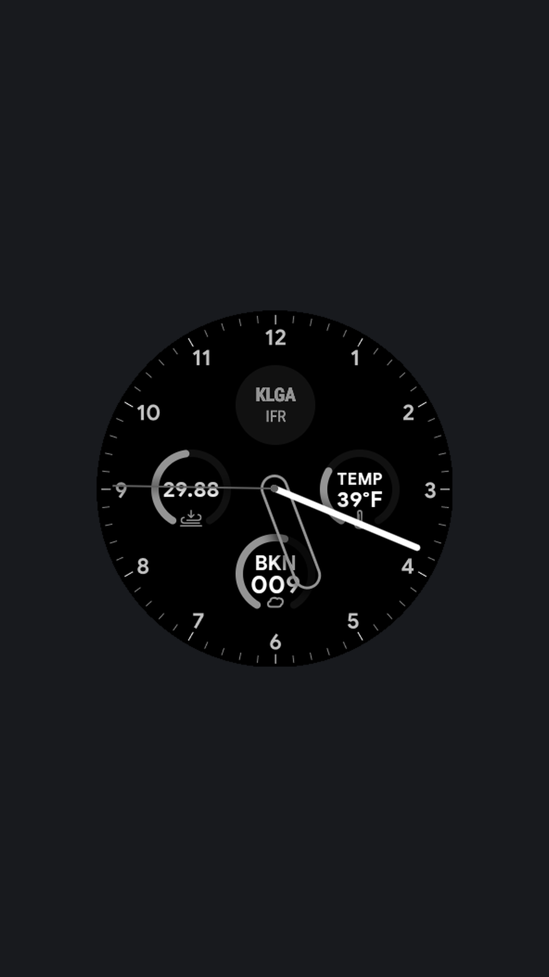 Classic analog watch face with aviation complications: airport identifier, altimeter setting, temperature, and cloud ceiling